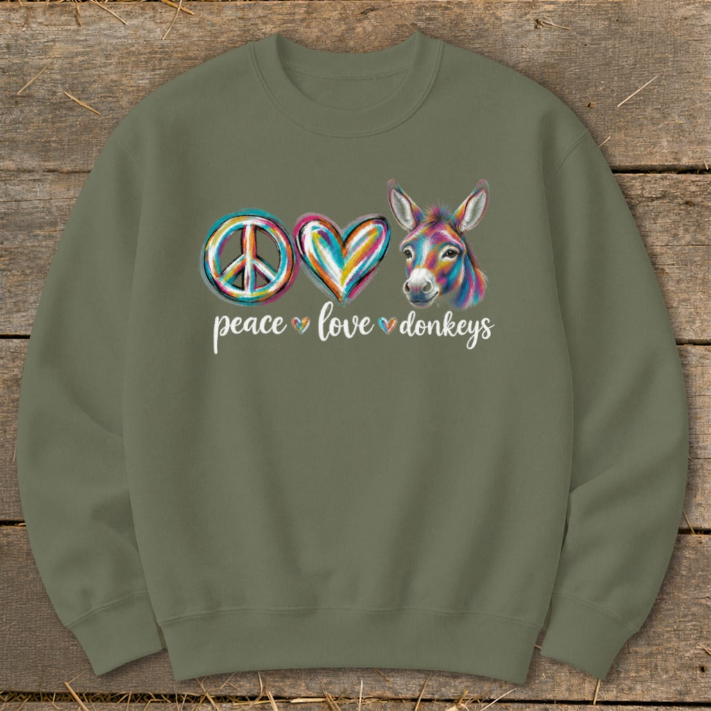 Peace love donkeys graphic on a green sweatshirt