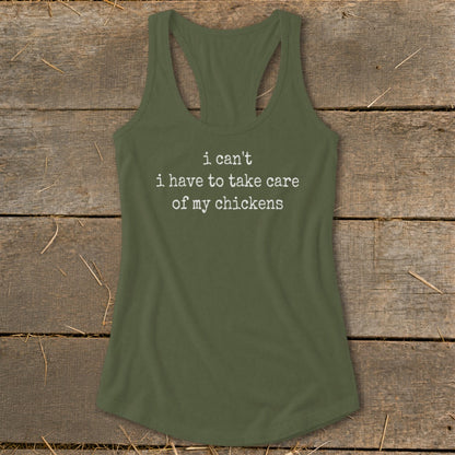 Olive green tank top with white text reading "i can't i have to take care of my chickens".