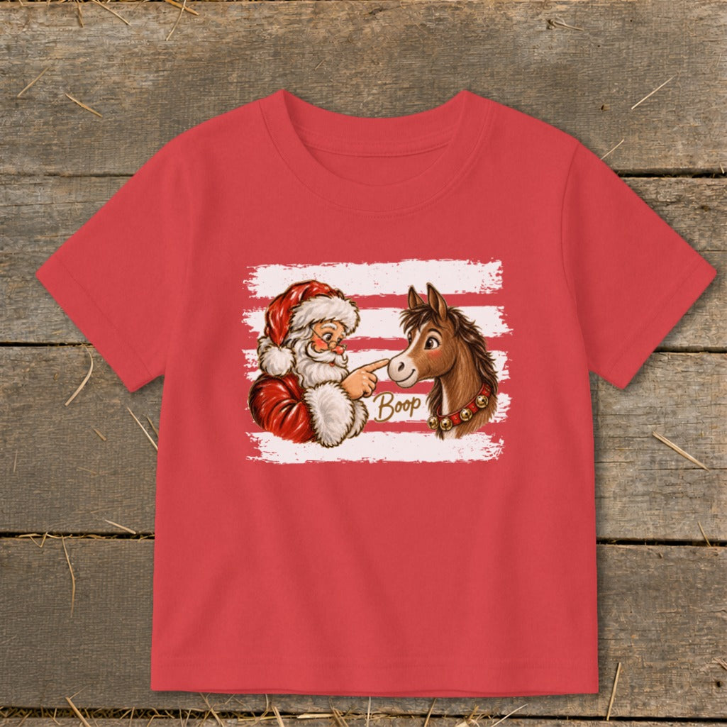 Santa booping a horse's nose with the word "Boop" on a red t-shirt.