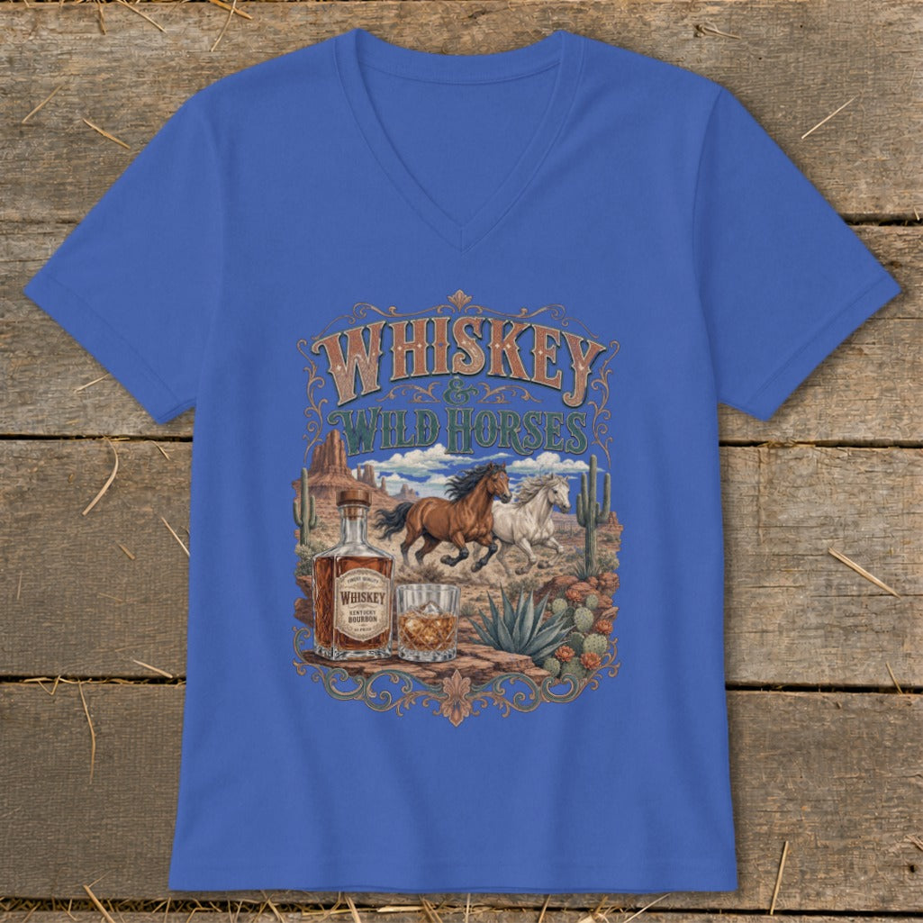 Blue v-neck t-shirt with "Whiskey & Wild Horses" graphic featuring running horses, whiskey bottle, and glass.