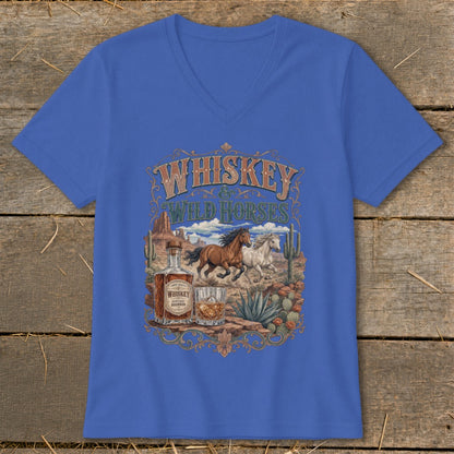 Blue v-neck t-shirt with "Whiskey & Wild Horses" graphic featuring running horses, whiskey bottle, and glass.