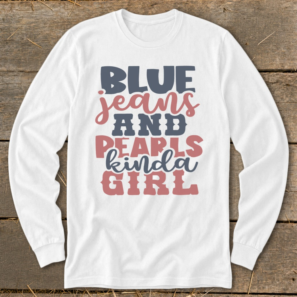 White long-sleeved shirt with "Blue jeans and pearls kinda girl" text.