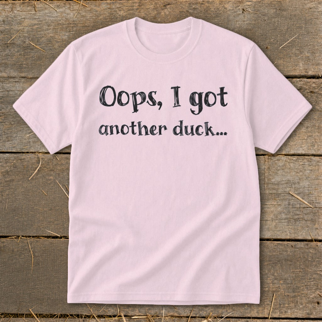 Pink t-shirt with black text reading "Oops, I got another duck..."