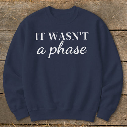 Navy sweatshirt with white text "IT WASN'T a phase"