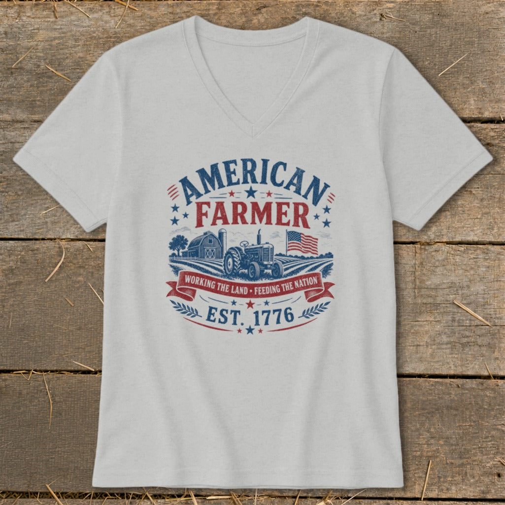 T-shirt graphic with "American Farmer" text, tractor, barn, and US flag.