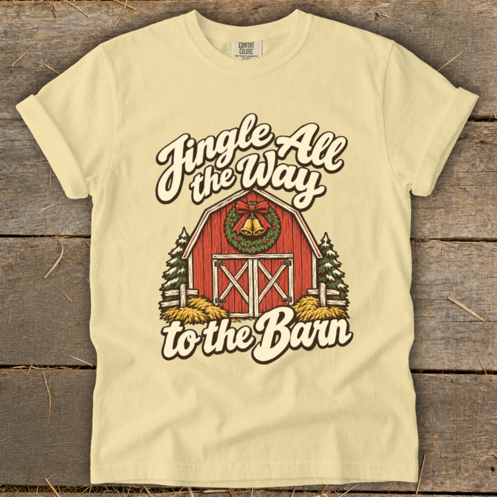 Light yellow t-shirt with red barn graphic and "Jingle All the Way to the Barn" text.