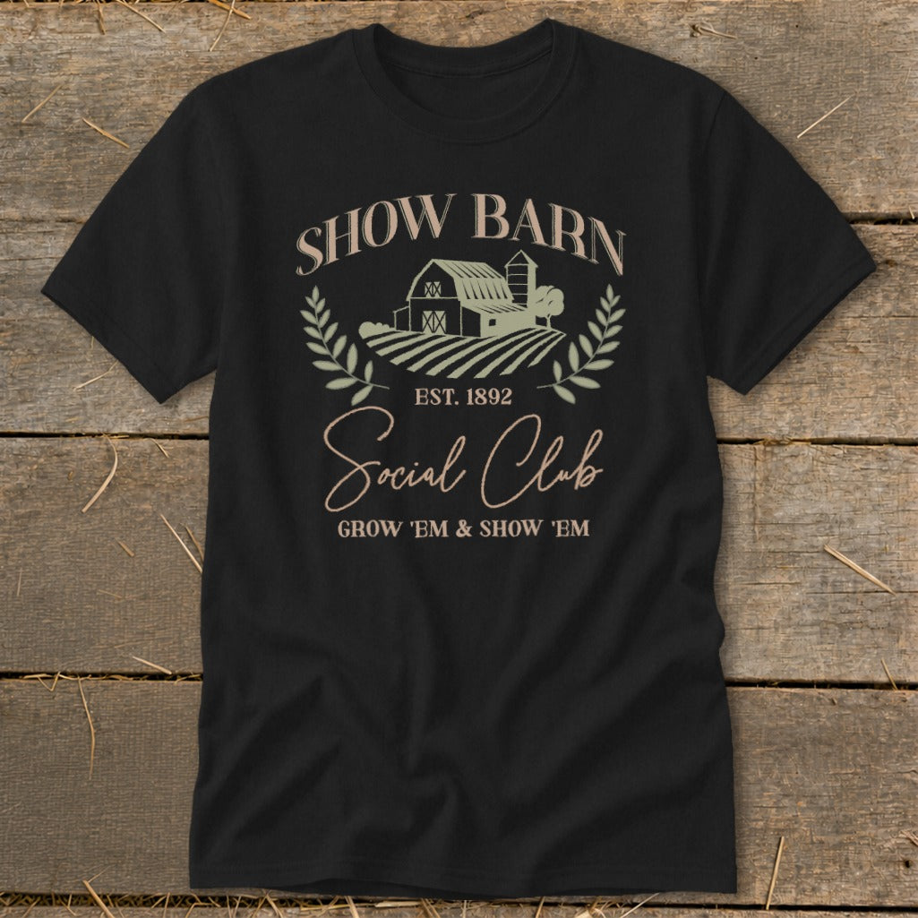Black t-shirt with "Show Barn Social Club" graphic and farm imagery.