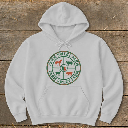 White hoodie with a circular farm logo featuring farm animals and text.