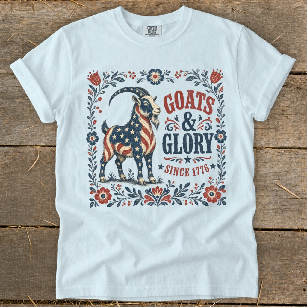White t-shirt with goats and glory design featuring a goat with American flag pattern.