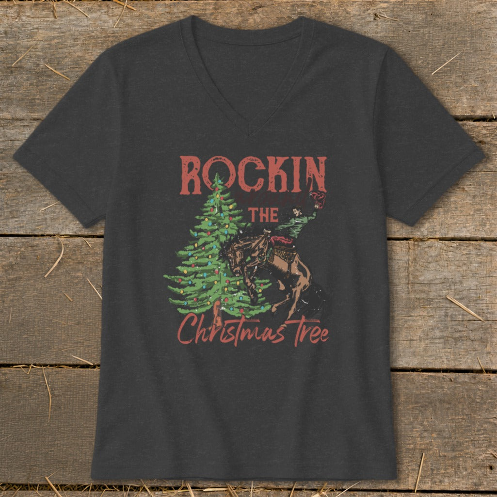 Dark gray v-neck t-shirt with "Rockin' The Christmas Tree" graphic featuring a cowboy on a horse.