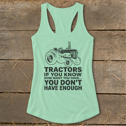 Mint green tank top with a tractor graphic and the text "Tractors if you know how many you have... you don't have enough."