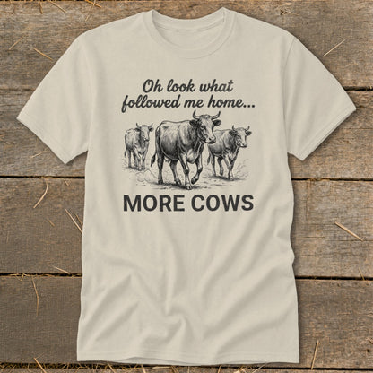 T-shirt with three cows and text "Oh look what followed me home... MORE COWS".