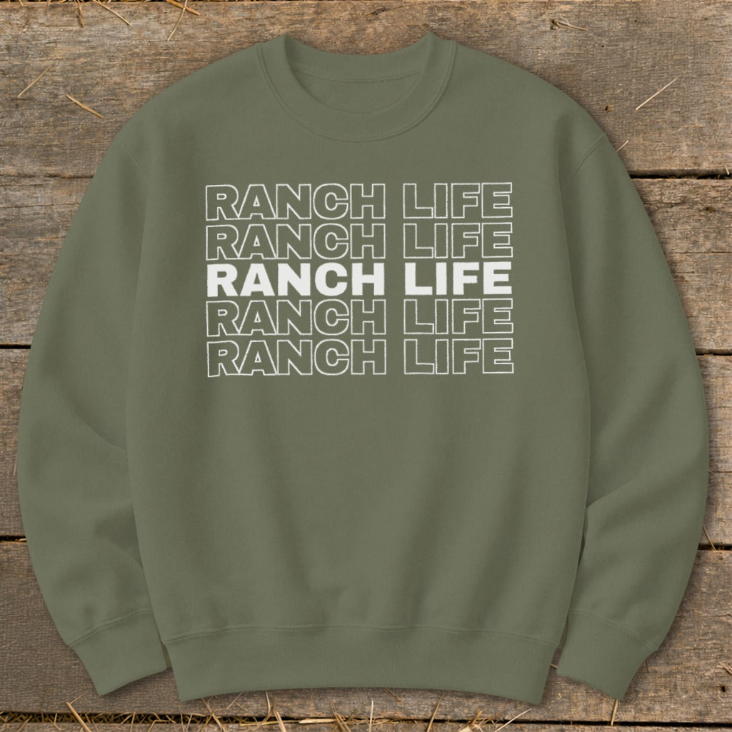Olive green crewneck sweatshirt featuring five stacked lines of text reading RANCH LIFE.