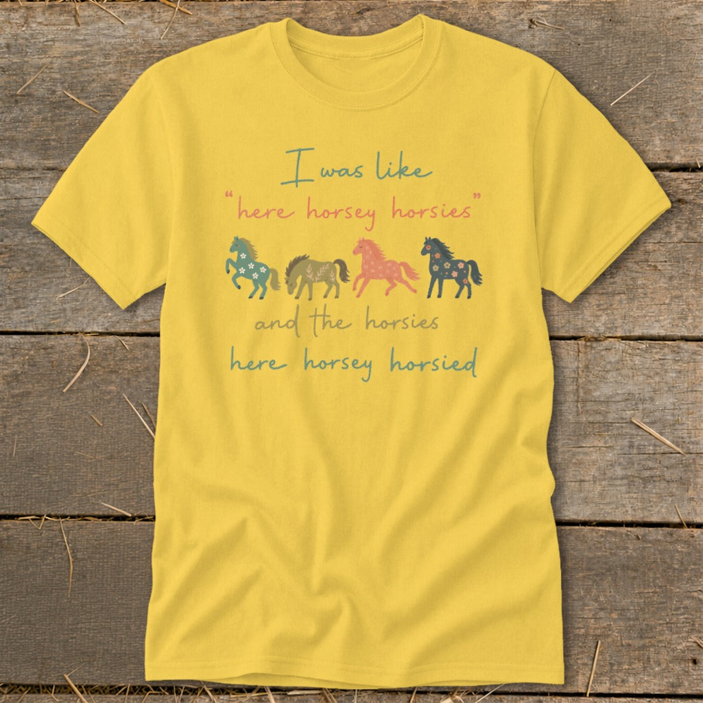 Yellow t-shirt with "I was like 'here horsey horsies' and the horsies here horsey horsied" text and horses.