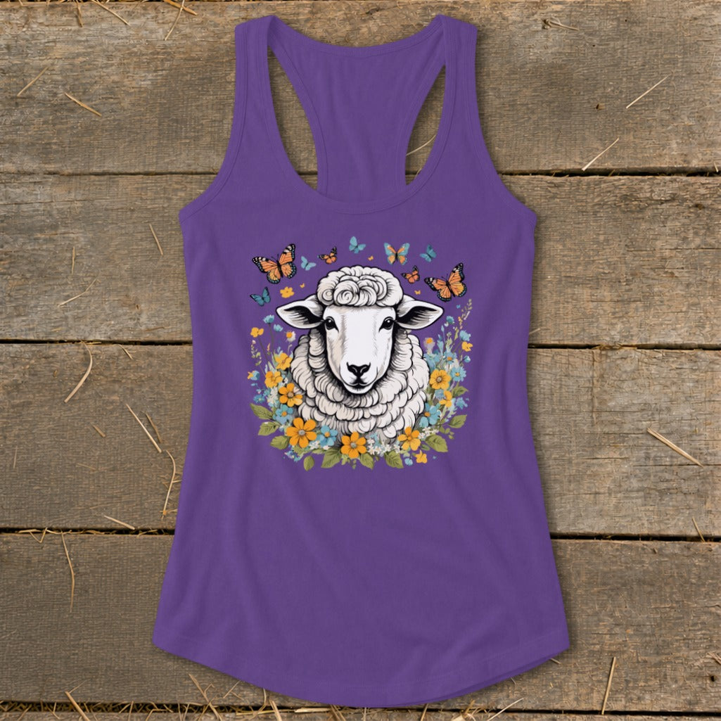 Purple tank top with a sheep, flowers, and butterflies graphic print.