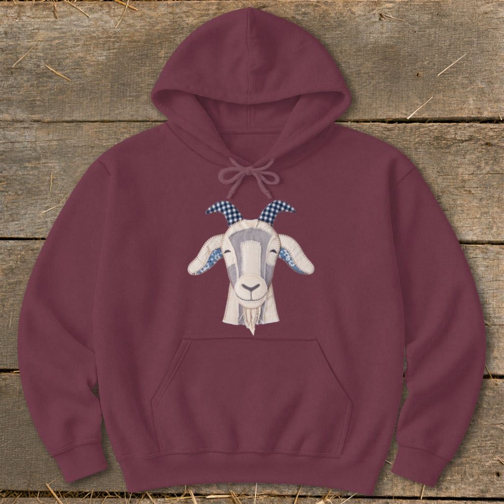 Maroon hoodie with a cheerful stitched goat face design.