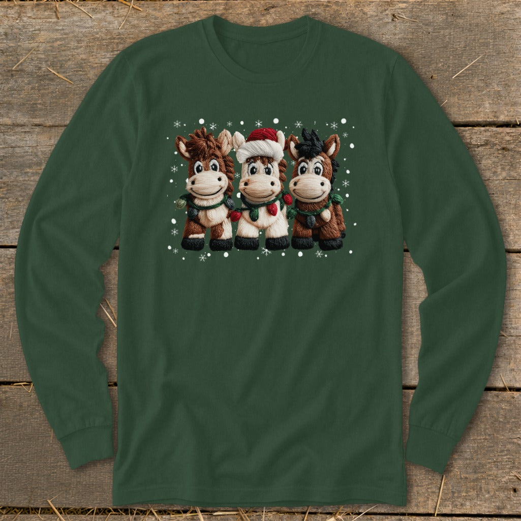 Three cartoon horses wearing Christmas lights and a Santa hat.