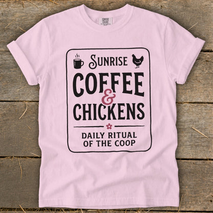Pink t-shirt with "Sunrise Coffee & Chickens Daily Ritual of the Coop" graphic.