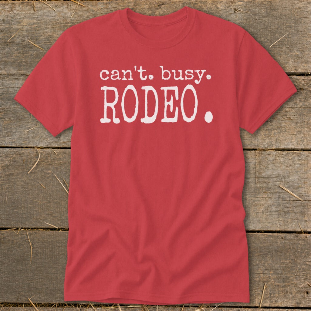 Red t-shirt with white text that reads "can't. busy. RODEO.".