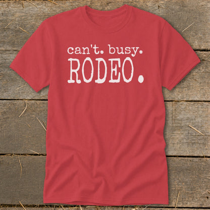 Red t-shirt with white text that reads "can't. busy. RODEO.".