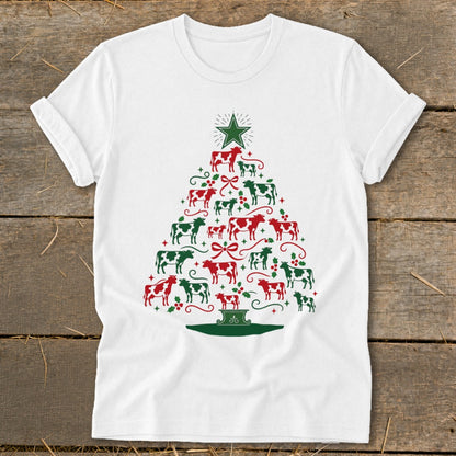 White t-shirt with a Christmas tree made of red and green cows.
