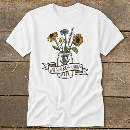 White t-shirt with a mason jar bouquet and "Wild and Barn Grown" banner.