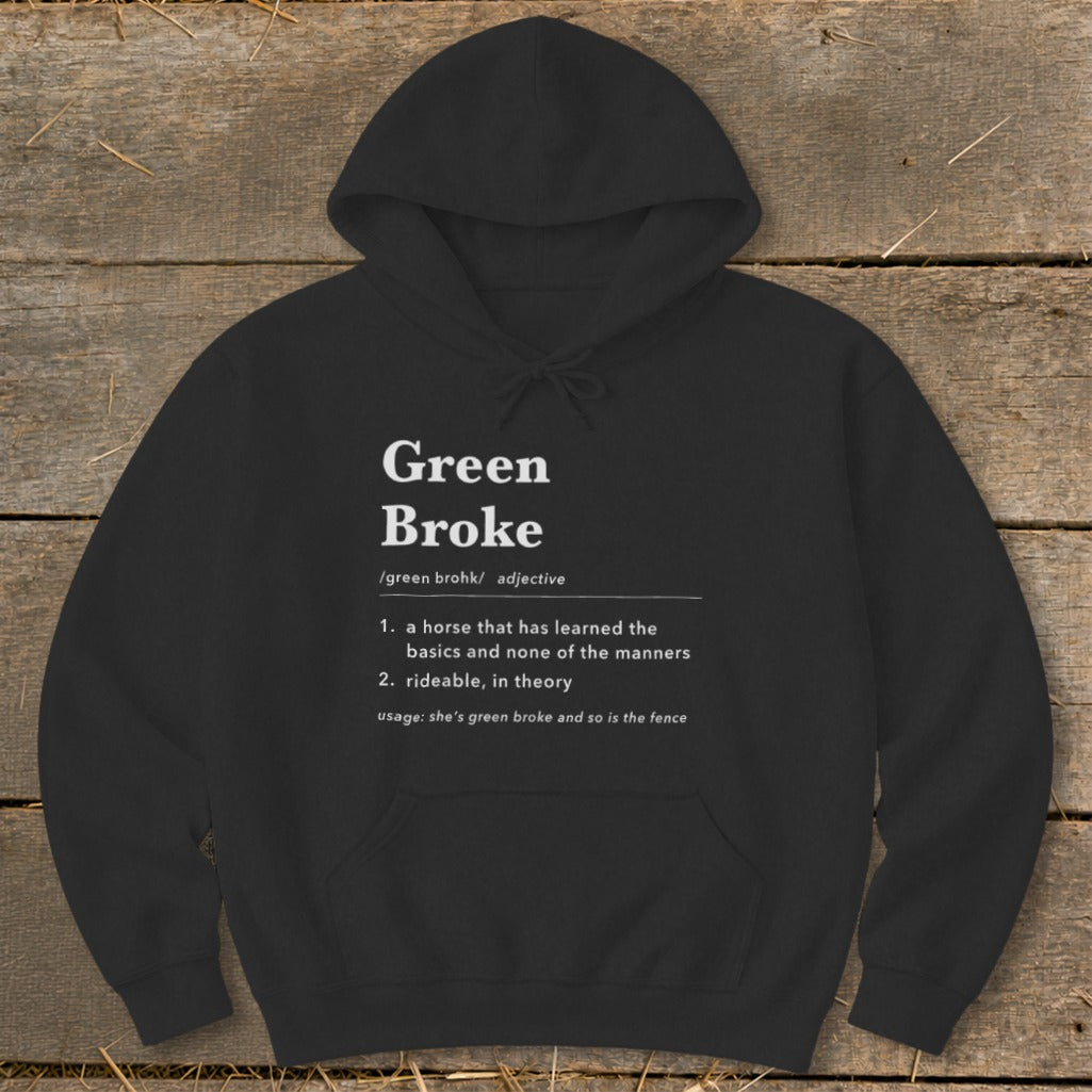 A black hooded sweatshirt featuring a humorous definition of Green Broke printed in white on the chest.