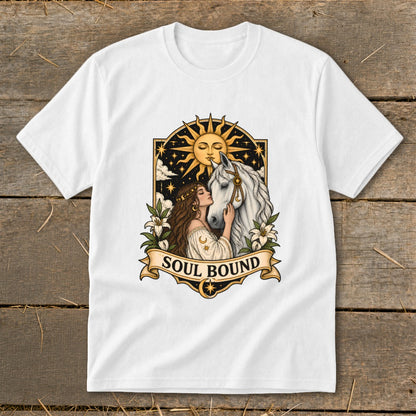 White t-shirt with "Soul Bound" text and artwork of a woman embracing a horse under a sun.
