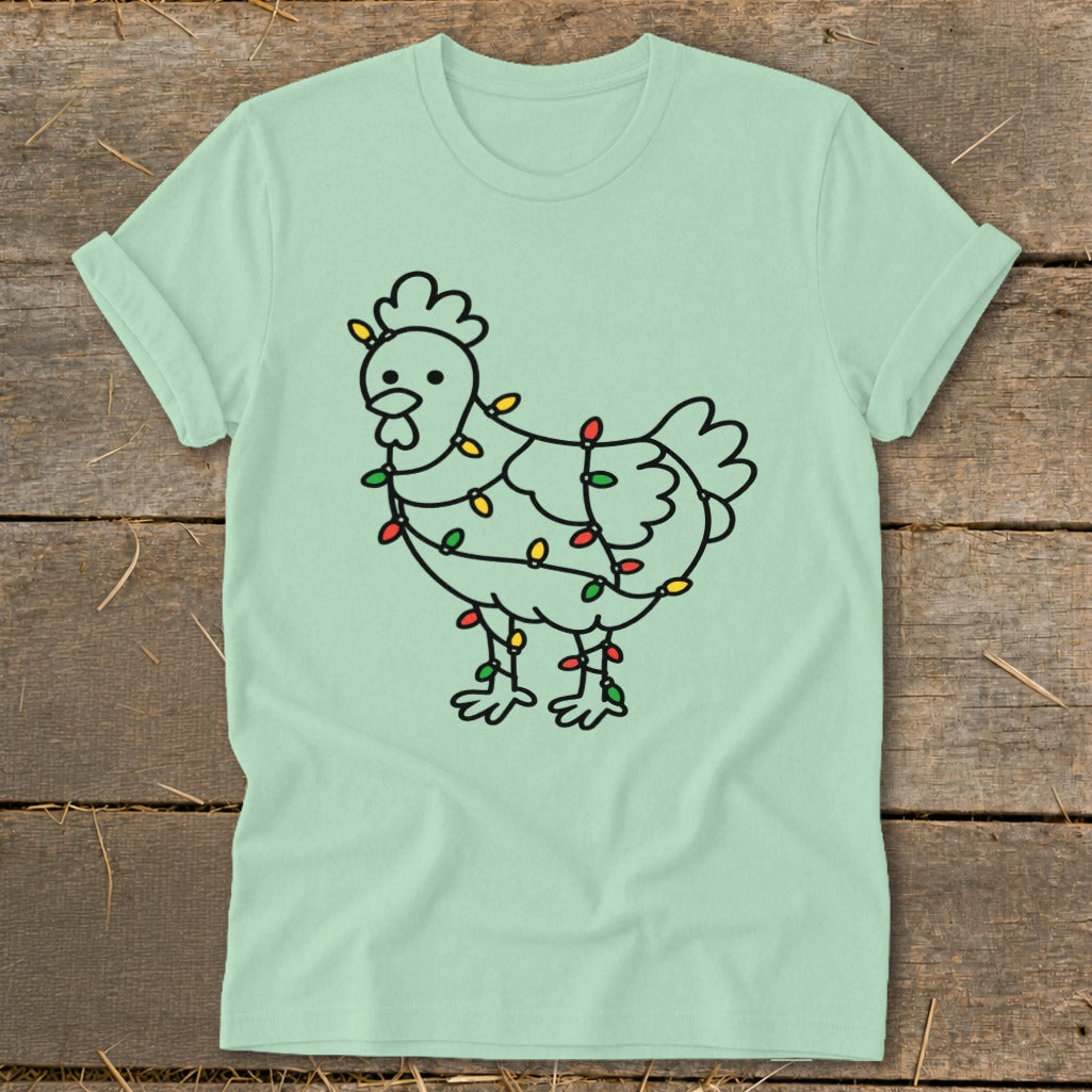 Light green t-shirt with a cartoon chicken wrapped in colorful Christmas lights.