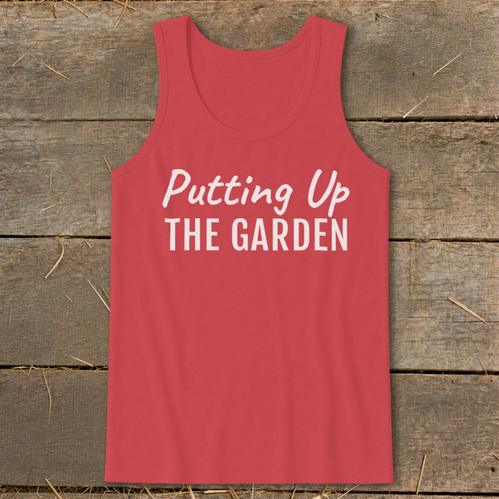 Coral tank top with white text "Putting Up THE GARDEN".