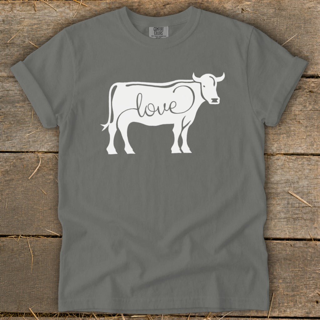 Grey t-shirt with white cow graphic featuring the word "love" inside its outline.
