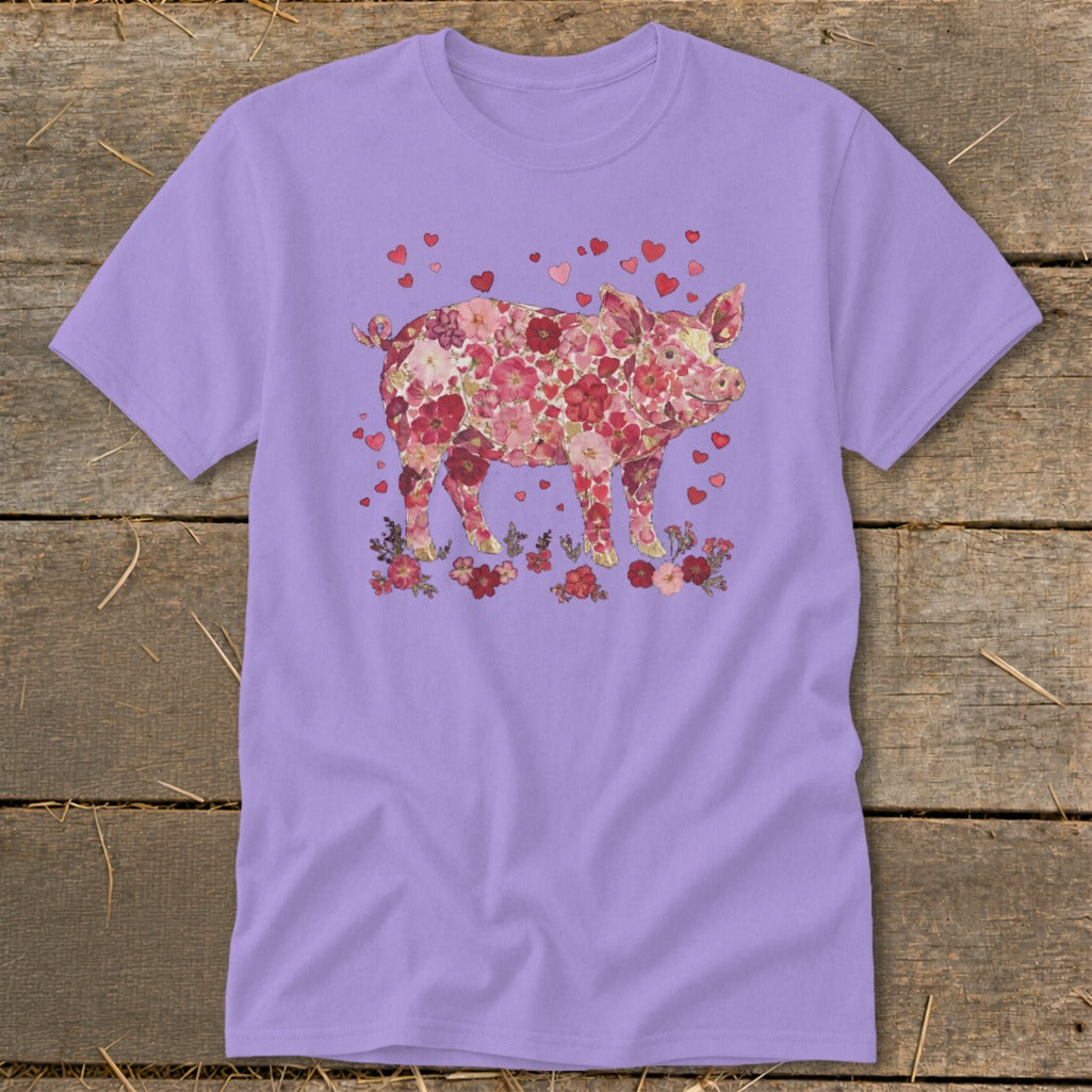 Lavender t-shirt with a floral pig graphic surrounded by hearts and flowers.