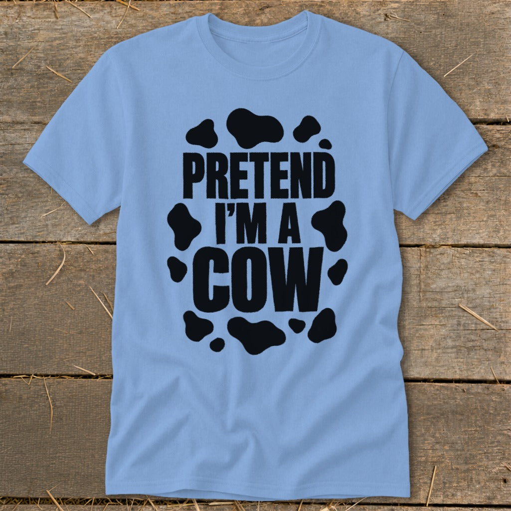 Light blue t-shirt with black text "PRETEND I'M A COW" and cow spots.