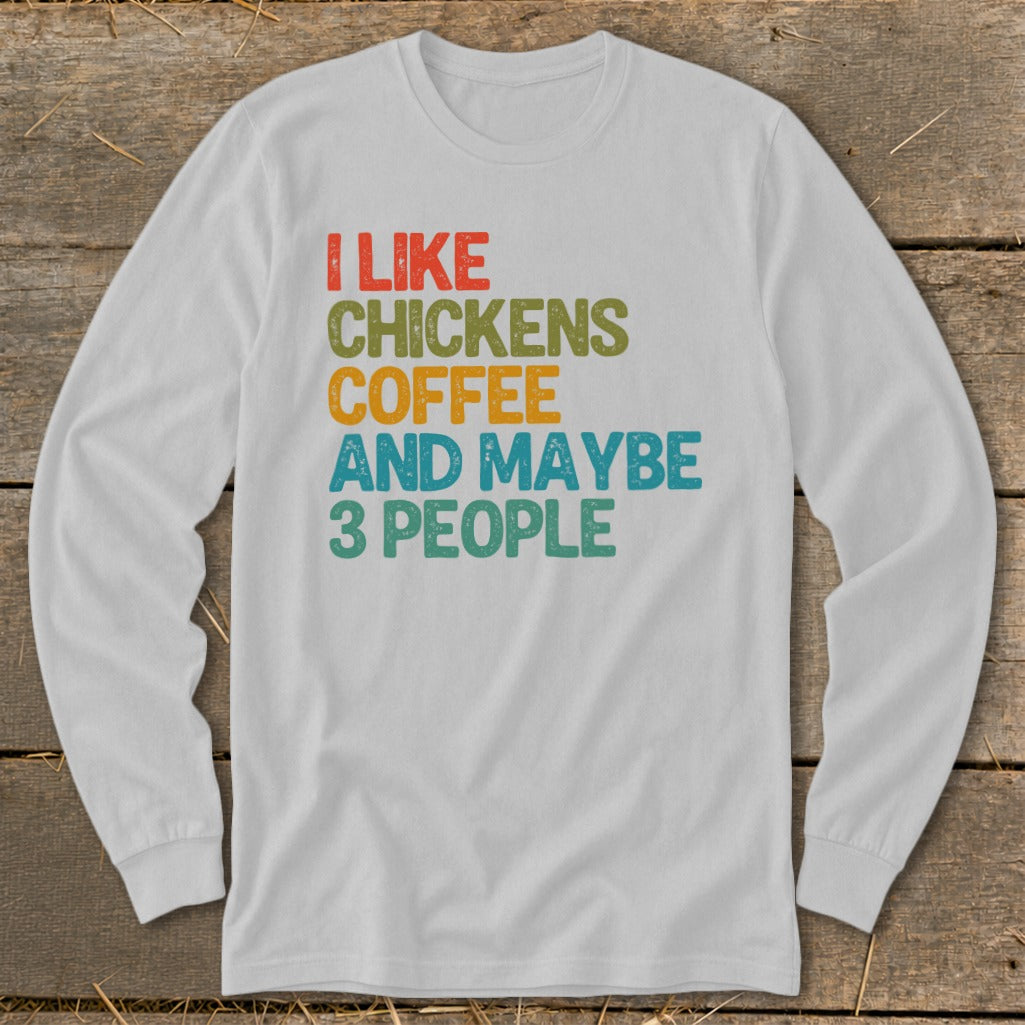 White long-sleeve shirt with text "I like chickens, coffee, and maybe 3 people."