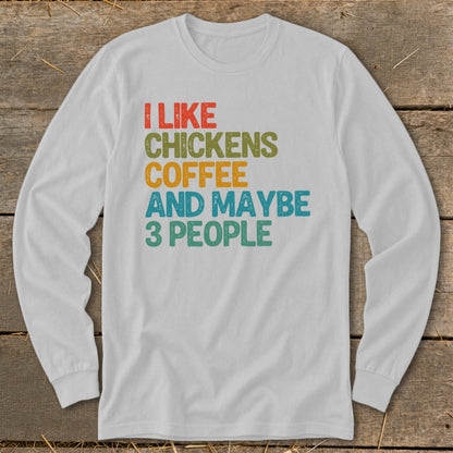 White long-sleeve shirt with text "I like chickens, coffee, and maybe 3 people."