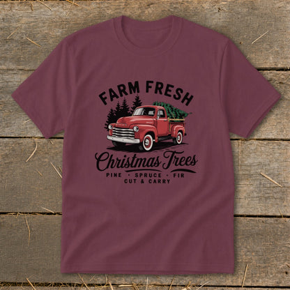 Red truck carrying Christmas trees with text "Farm Fresh Christmas Trees".