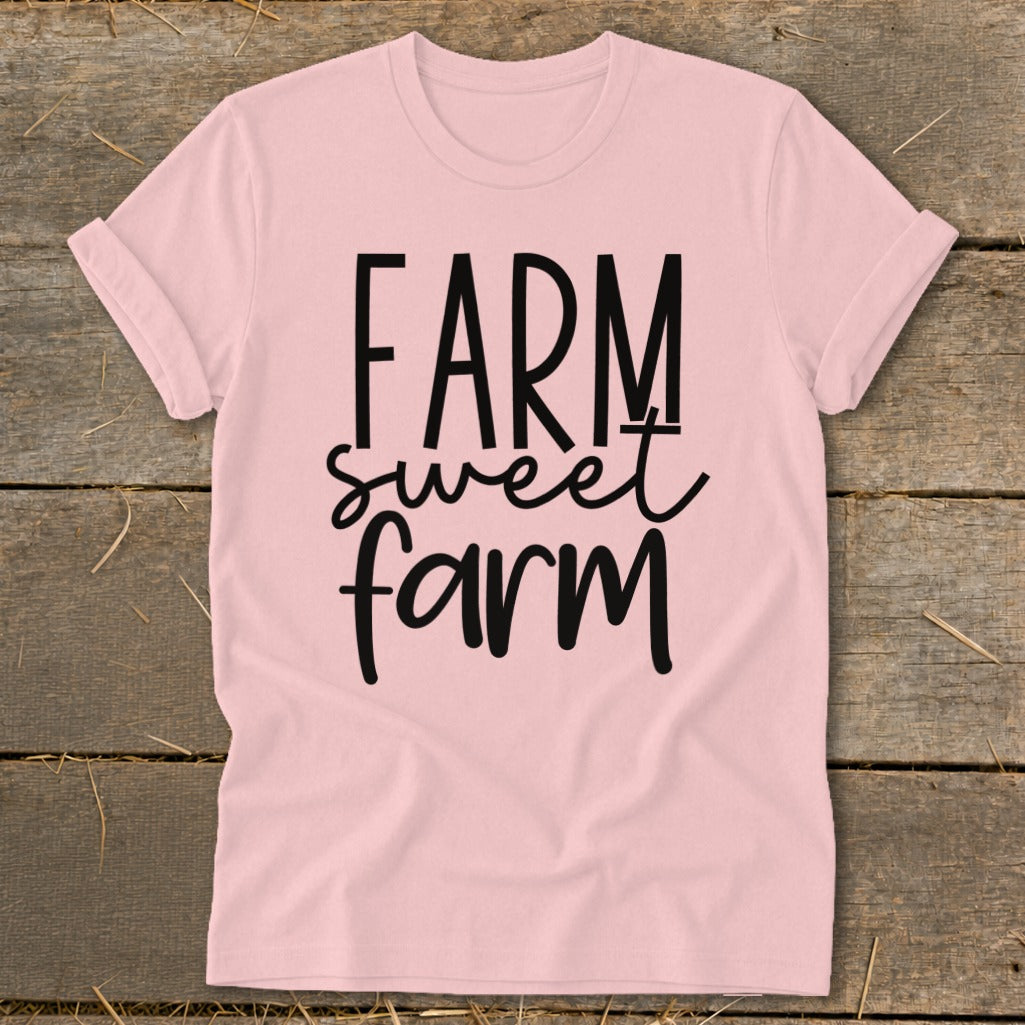 Pink t-shirt with black text reading "FARM sweet farm"