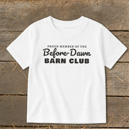 White t-shirt with black text reading "Proud Member of the Before-Dawn Barn Club".