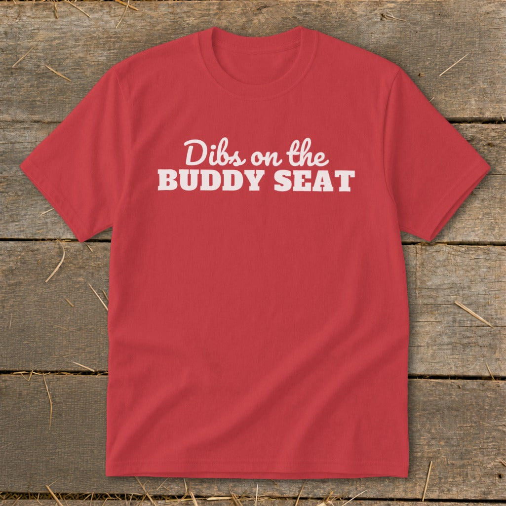 Red t-shirt with white text reading "Dibs on the BUDDY SEAT".