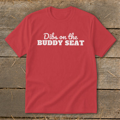 Red t-shirt with white text reading "Dibs on the BUDDY SEAT".