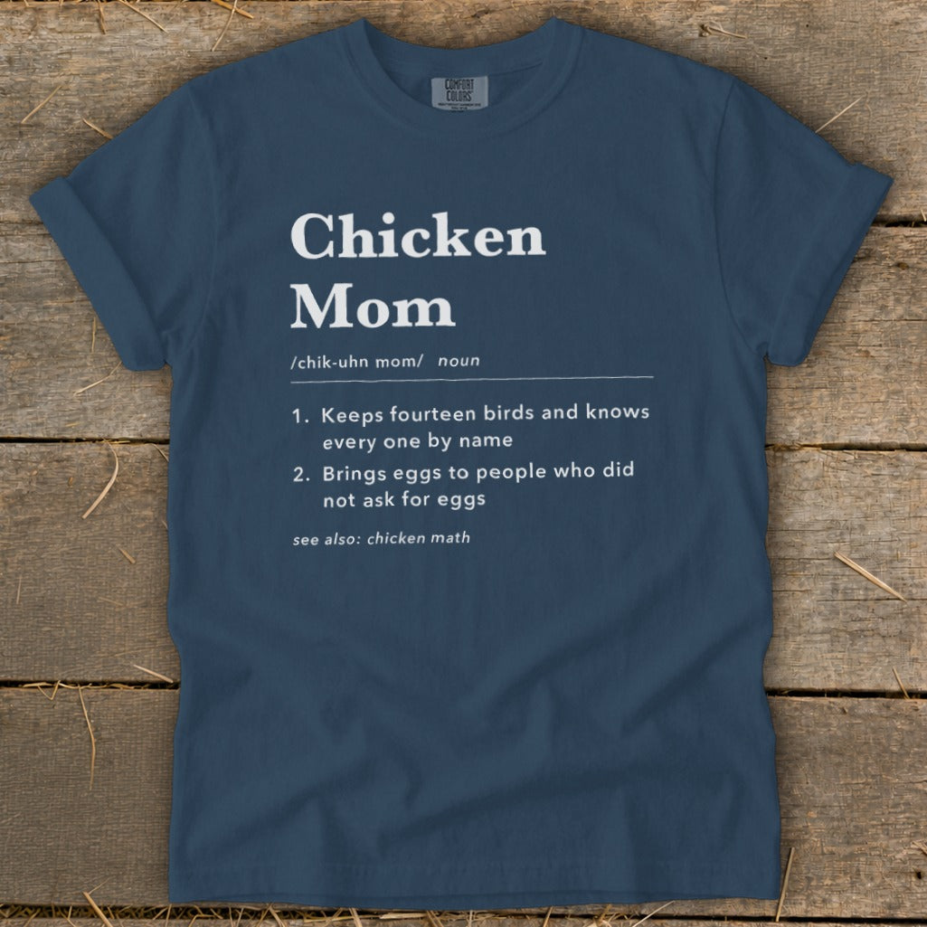 Navy t-shirt with white text defining "Chicken Mom" and its characteristics.