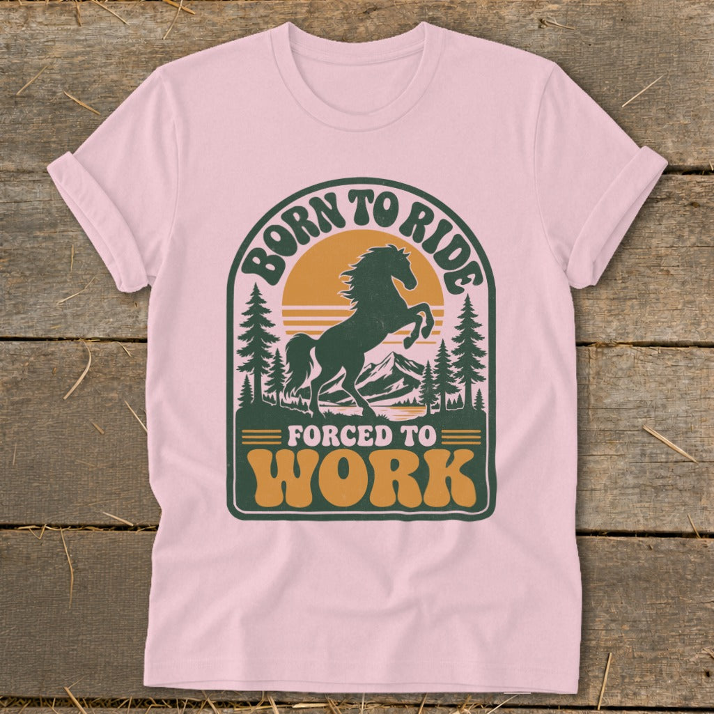 Pink t-shirt with "Born to Ride Forced to Work" horse graphic.