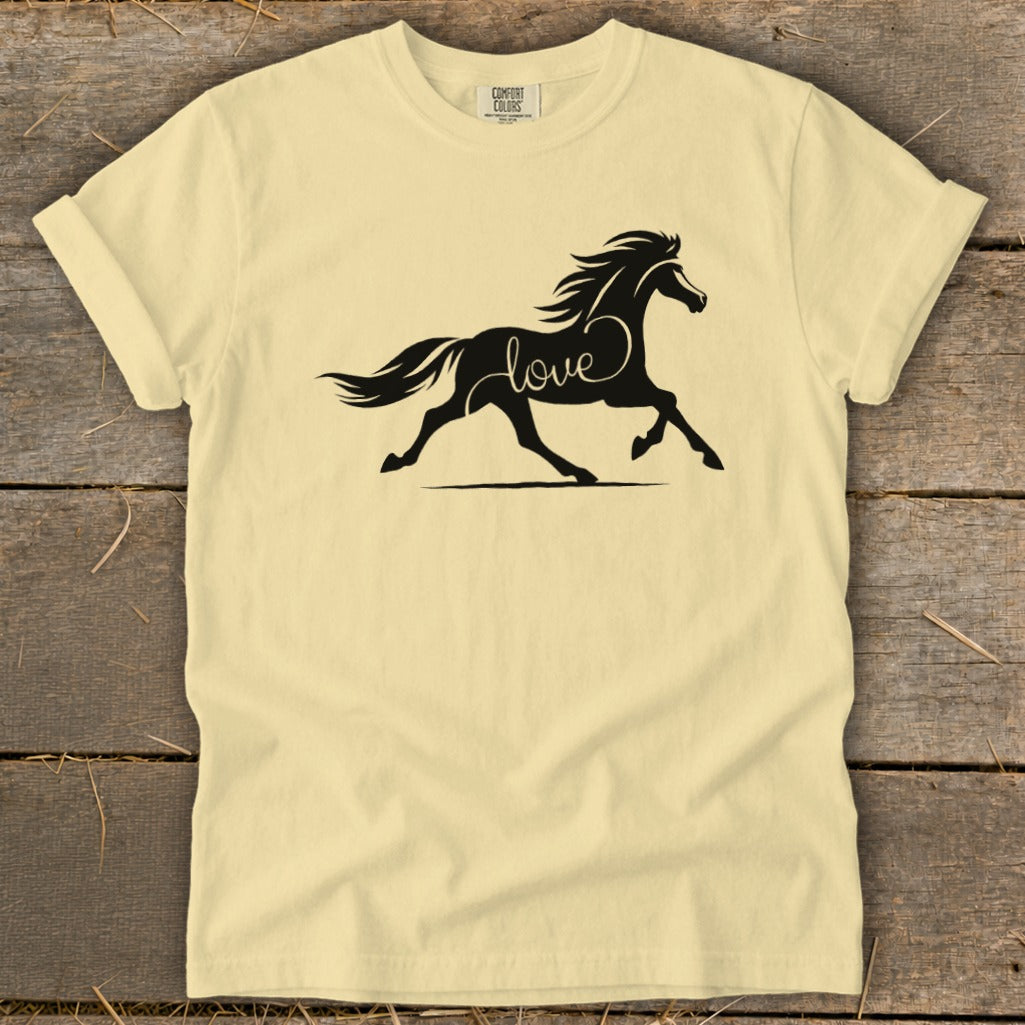 Light yellow t-shirt with a black silhouette of a running horse with the word "love" within its mane.