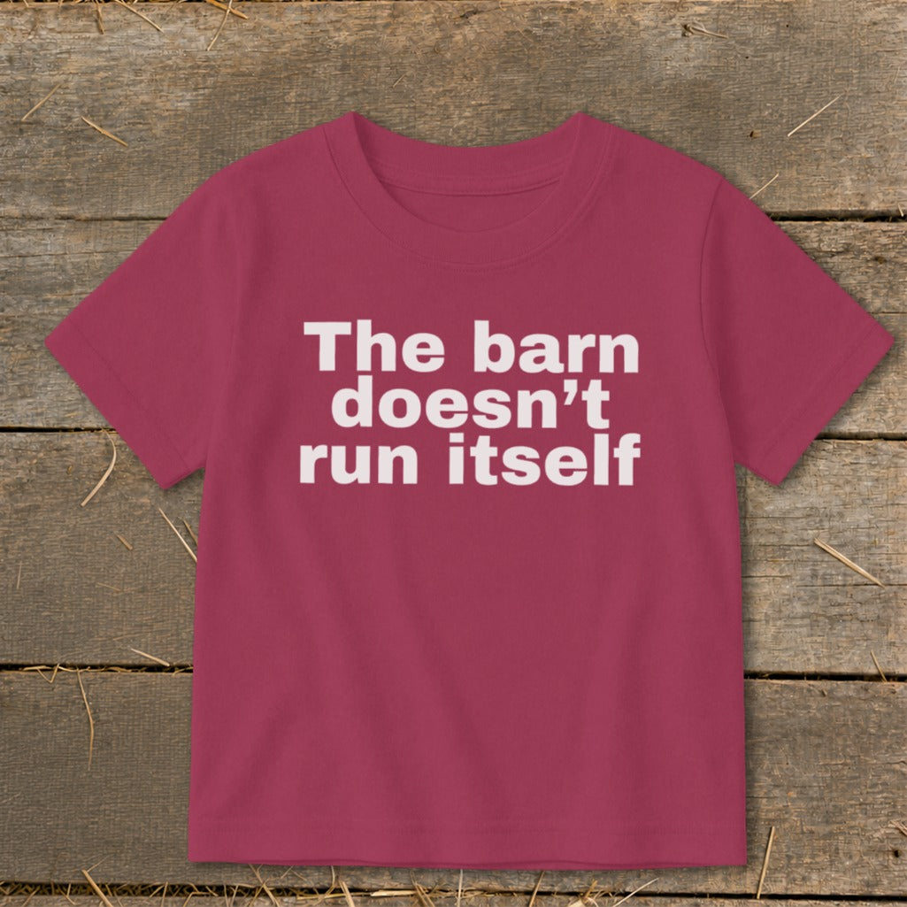 Crimson t-shirt with white text that reads "The barn doesn't run itself."