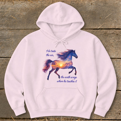 Light pink hoodie featuring a graphic of a galloping horse with a sunset sky silhouette and text.
