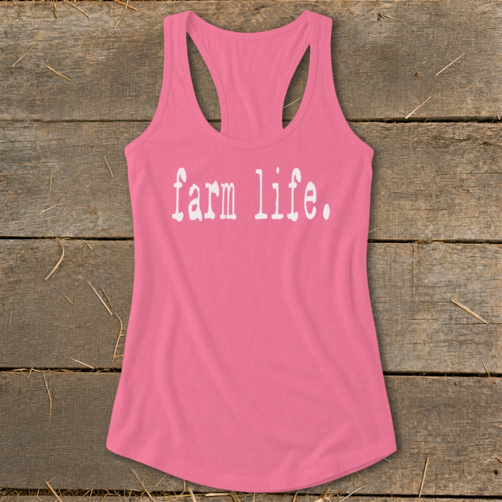 Pink racerback tank top with white text reading "farm life."