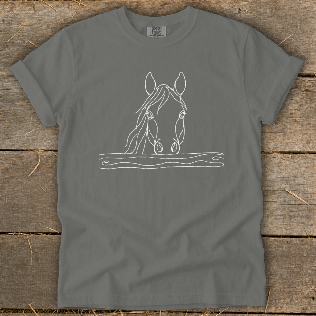 Gray t-shirt with white line drawing of a horse's head peeking over a wooden fence.