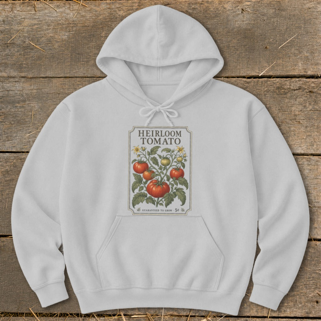 White hoodie with an "Heirloom Tomato" seed packet graphic.