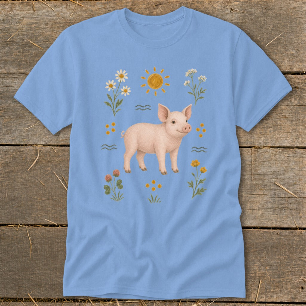 Light blue t-shirt with a pink piglet and colorful wildflowers design.