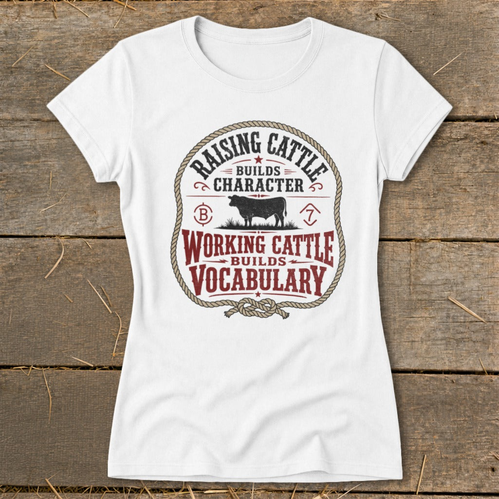 White t-shirt with "Raising Cattle Builds Character, Working Cattle Builds Vocabulary" text.
